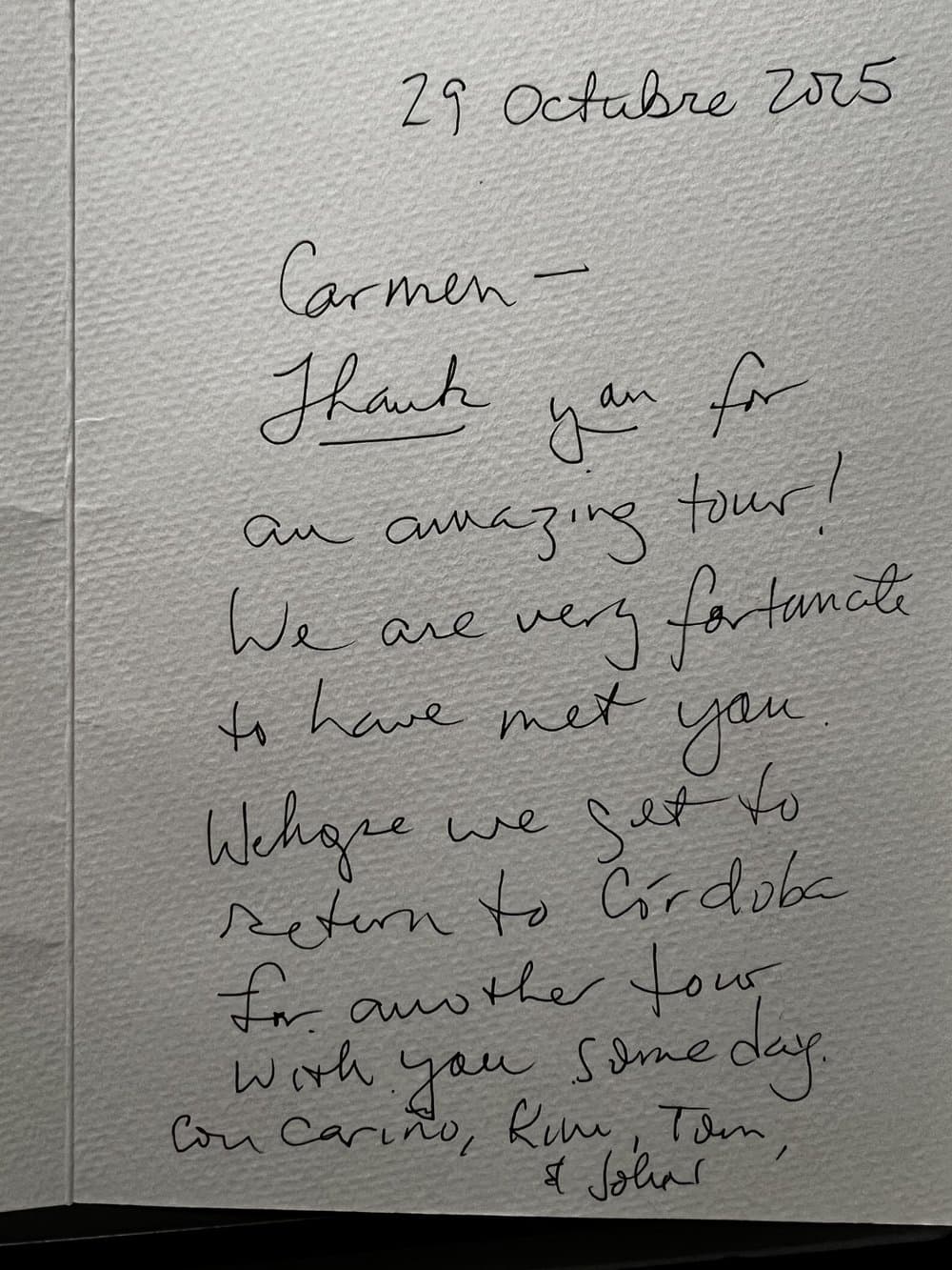 Handwritten review from Kim, Tom & John